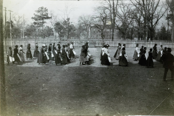 African American women marching in procession, 1899.