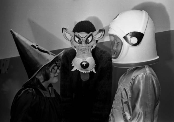 A witch, Big Bad Wolf, and astronaut prepare for Halloween, 1962. Image from The State Newspaper Photograph Archive.