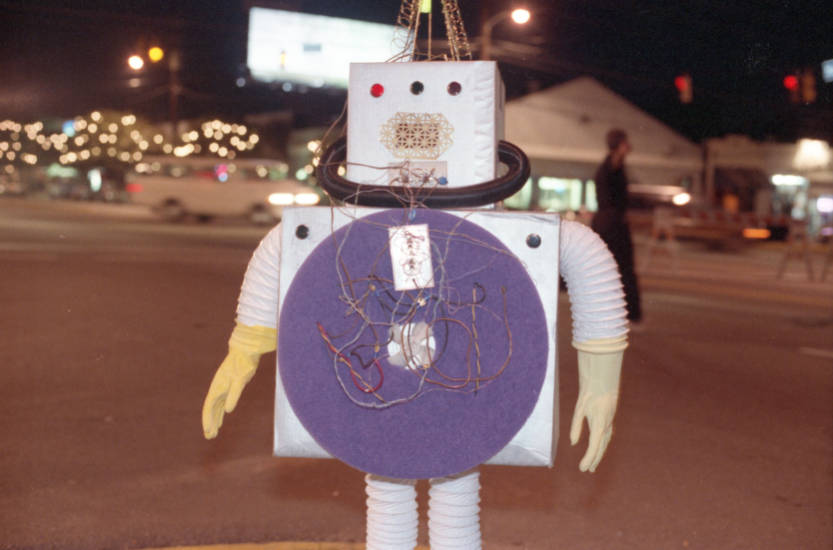 Someone dressed as a robot in Five Points, 1990. Image from The State Newspaper Photograph Archive.