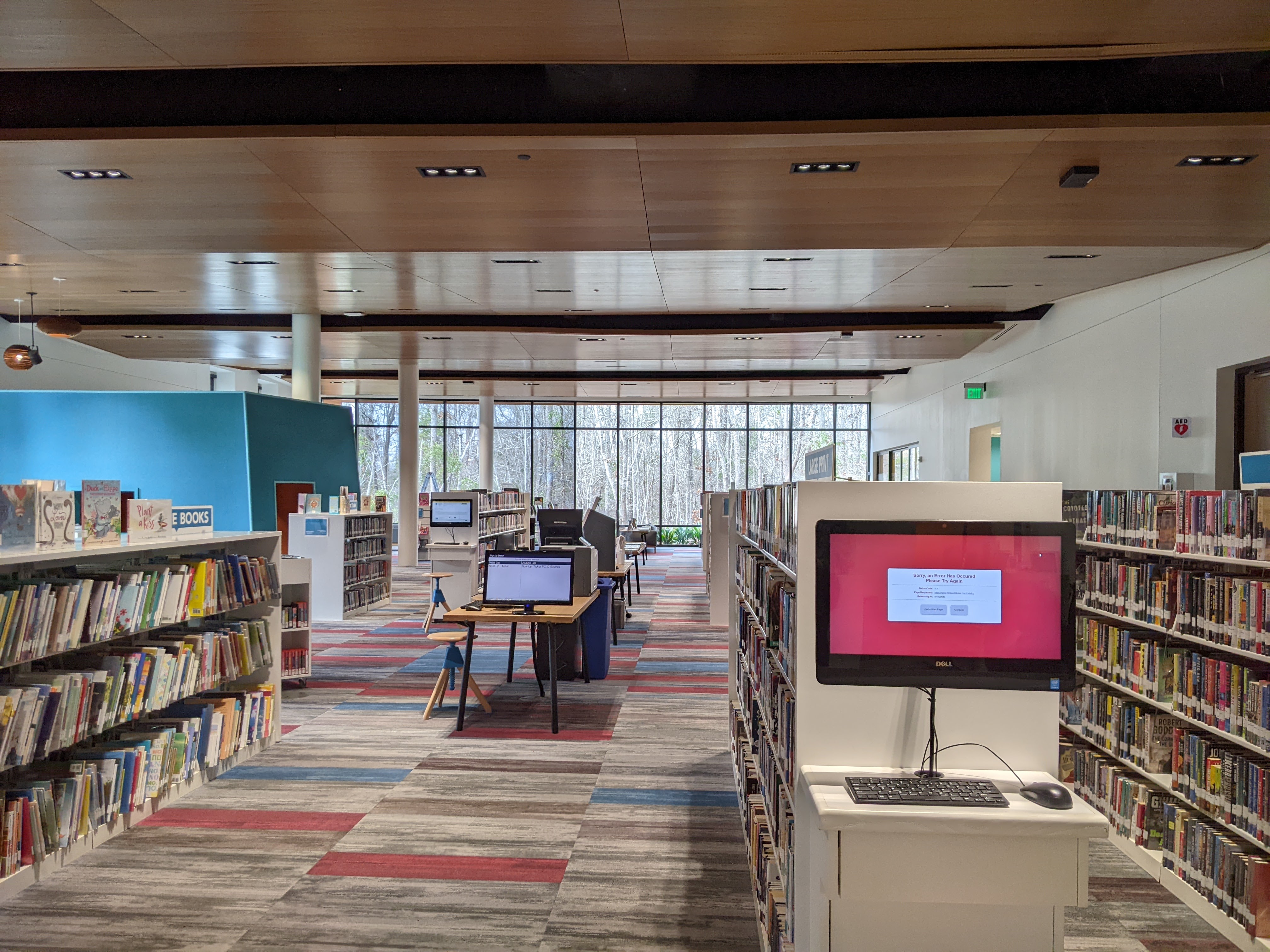From inside the library. Installed panels are on the left and bare windows are on the right.