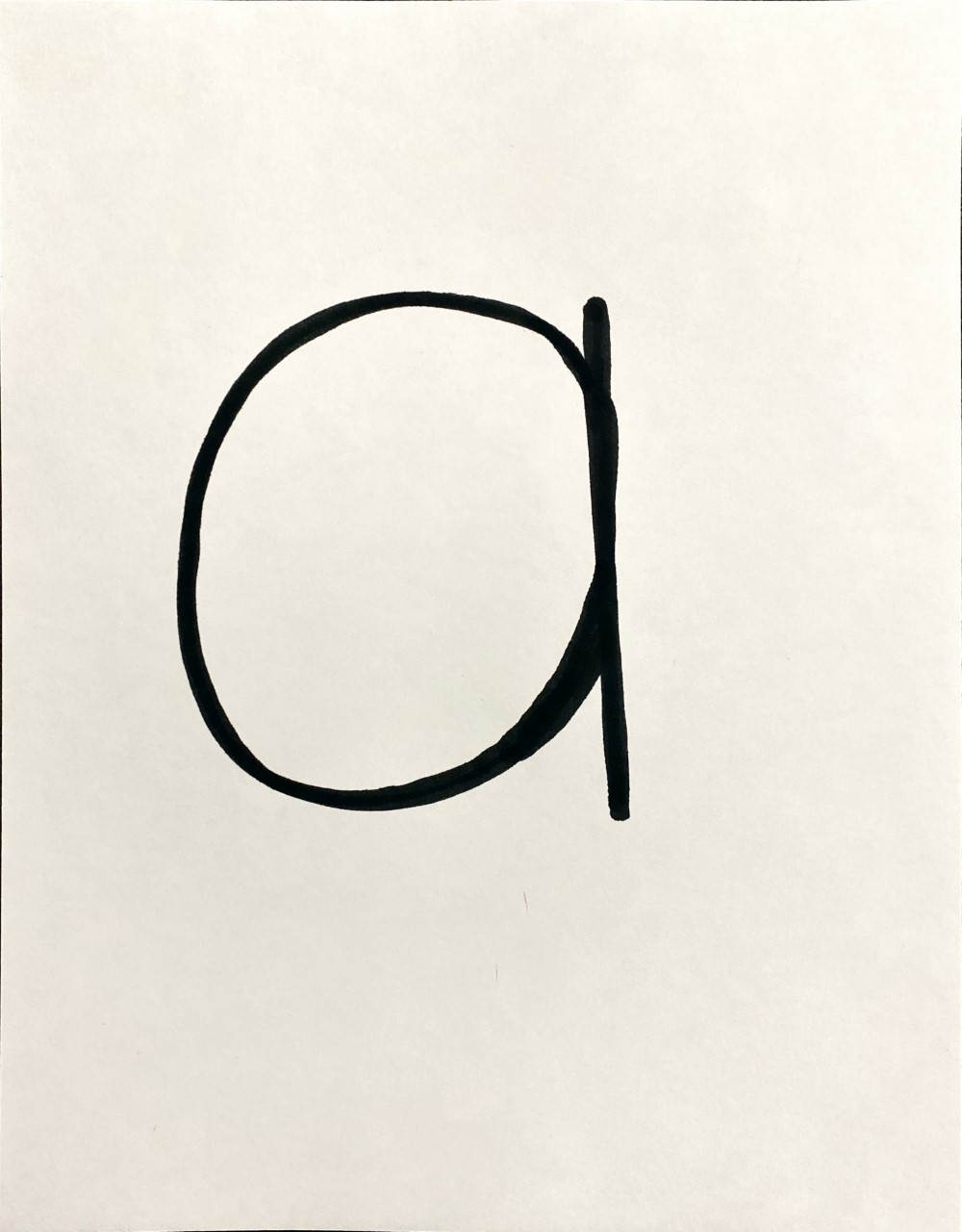 Lower case letter written on an 8.5 x 11 paper