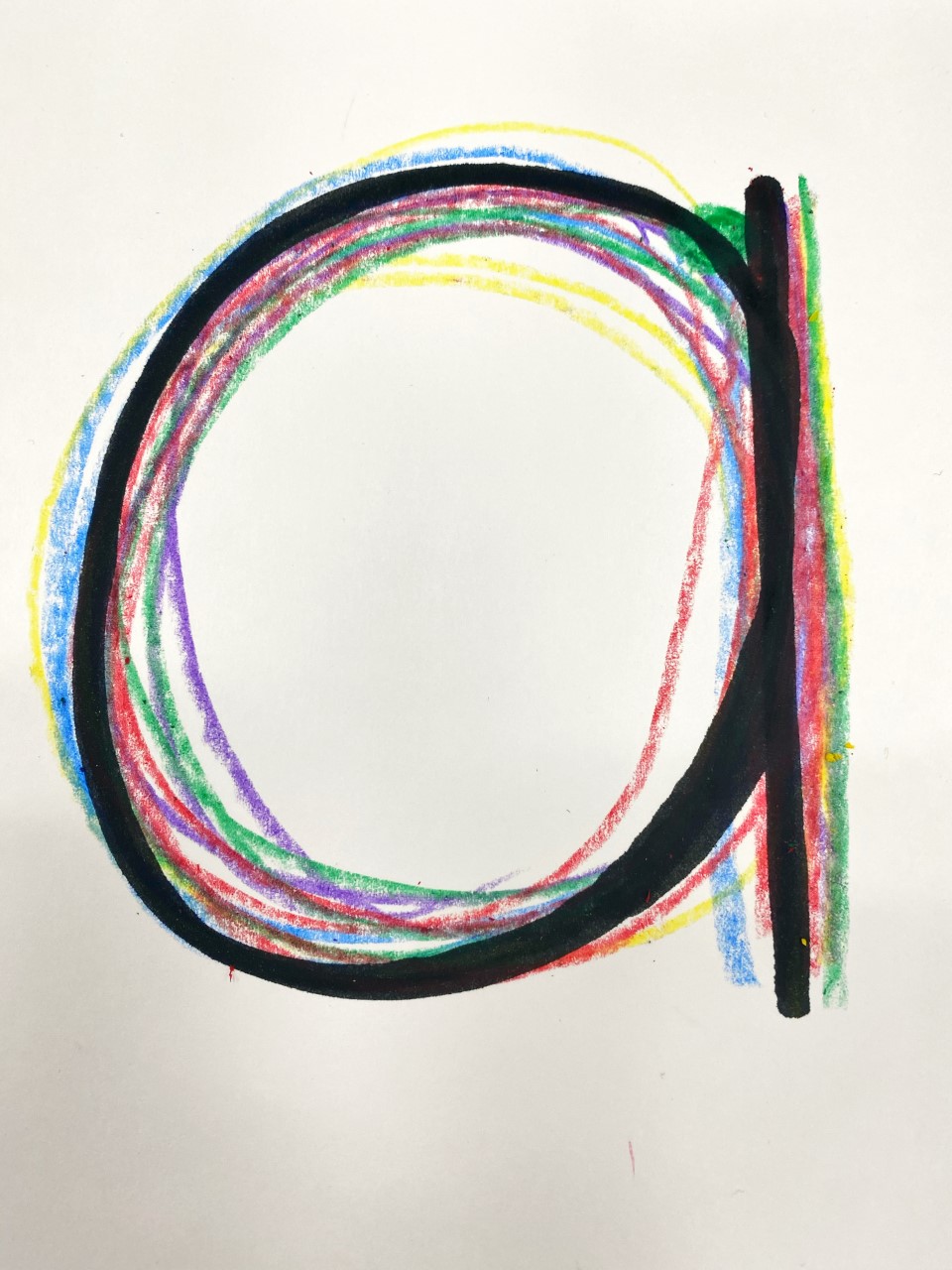 Lower case letter traced repeatedly in crayon