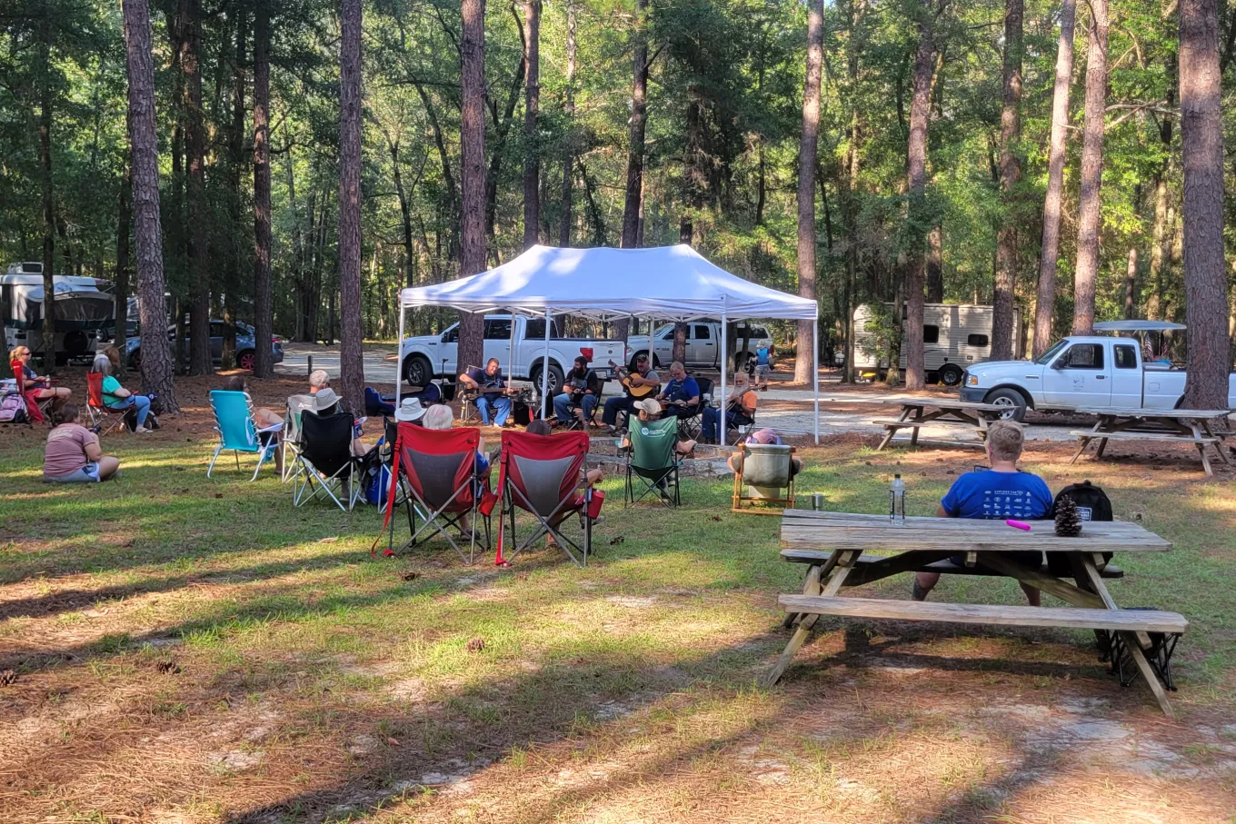 crowd of people in camping chairs