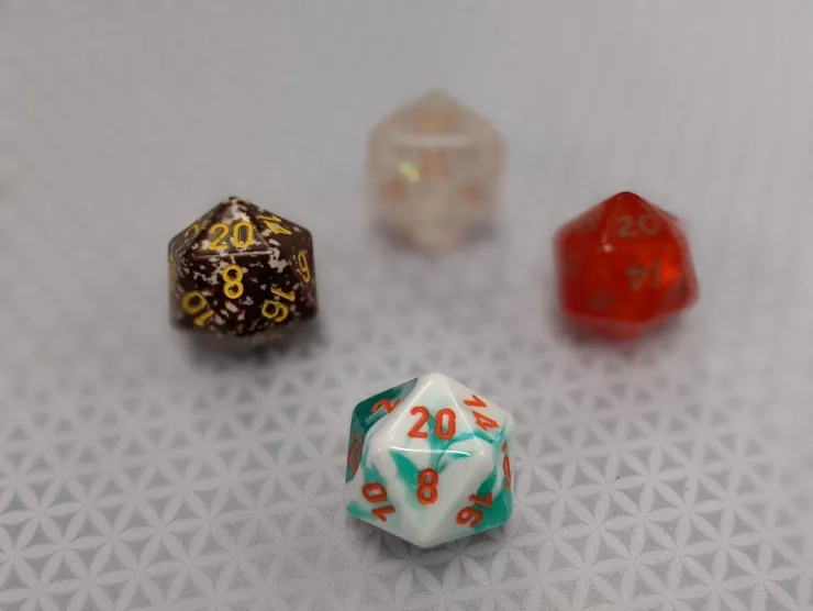 Four twenty-sided dice