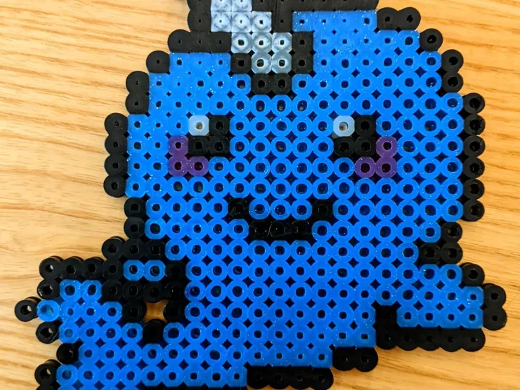 Blue narwhal with a silver horn made out of perler beads