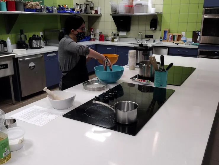 action shot of Jenny during a cooking program