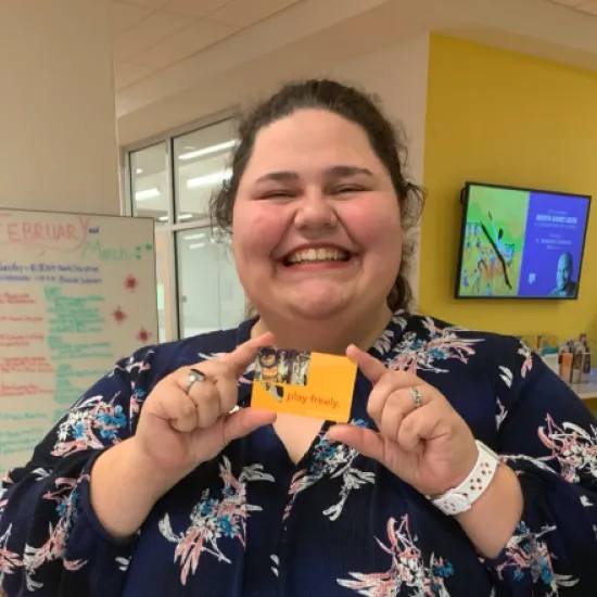 Excited Customer with Library Card