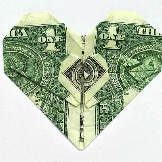 Dollar folded into shape of a heart