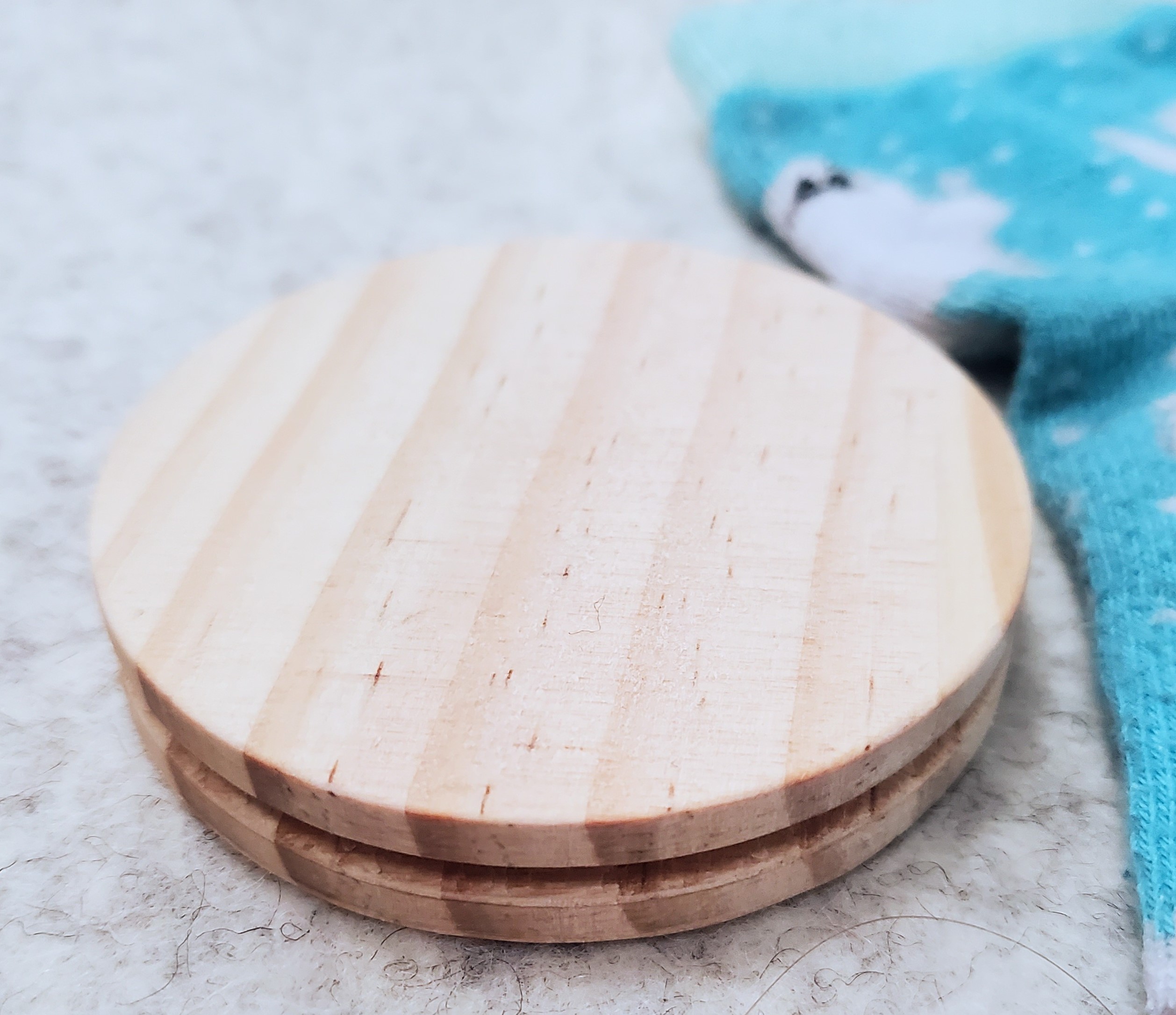 wooden disc 1 inch thick with groove with rubber band