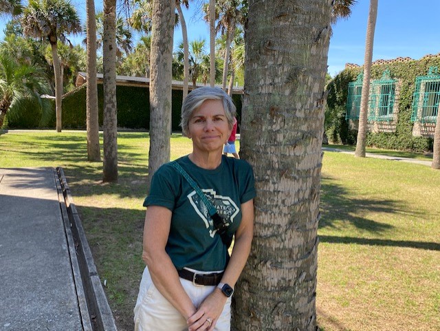 woman wearing Ultimate Outsider shirt