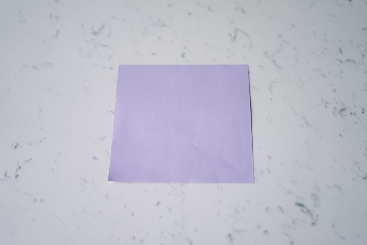 one piece of purple origami paper