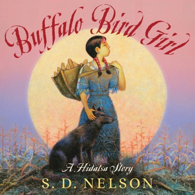 Cover of Buffalo Bird Girl features a young Hidatsa girl in traditional dress standing with her dog both look to the right, cornstalks and the sun are in the background.