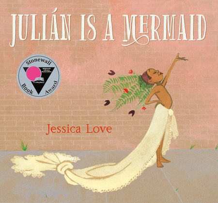 Front cover of Julián Is a Mermaid | Young Afro-Latino boy stands on a sidewalk in front of a brick wall.  His left hand is raised up and his right hand is on his hip.  He is wearing a white skirt that looks like a mermaid's tail with a flowered headdress.  He is bare-chested. 