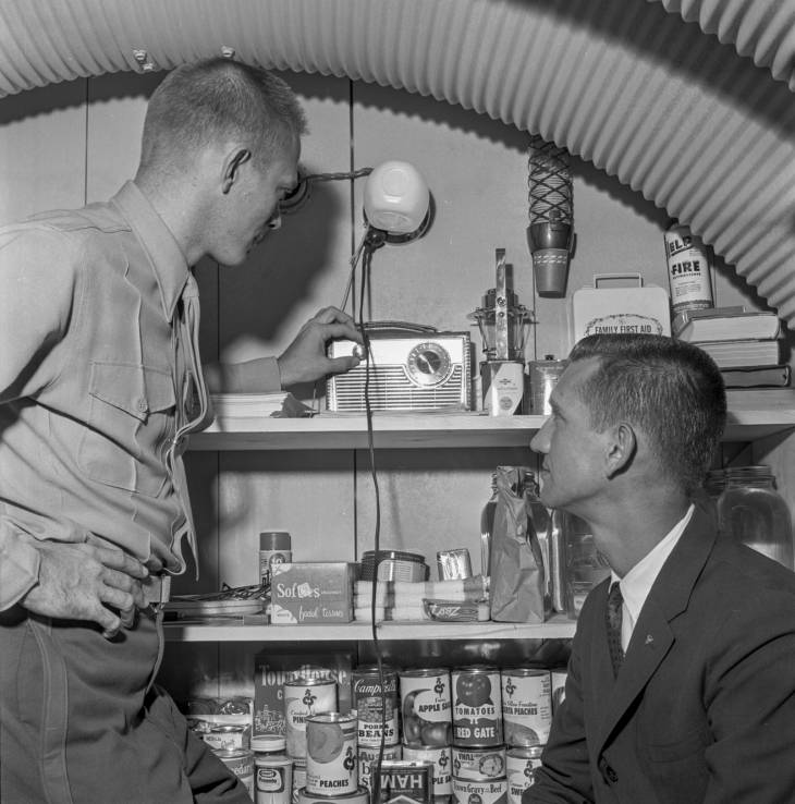 ​​Men in a fallout shelter at the State Fair