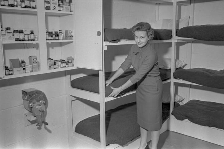 Woman in her family fallout shelter
