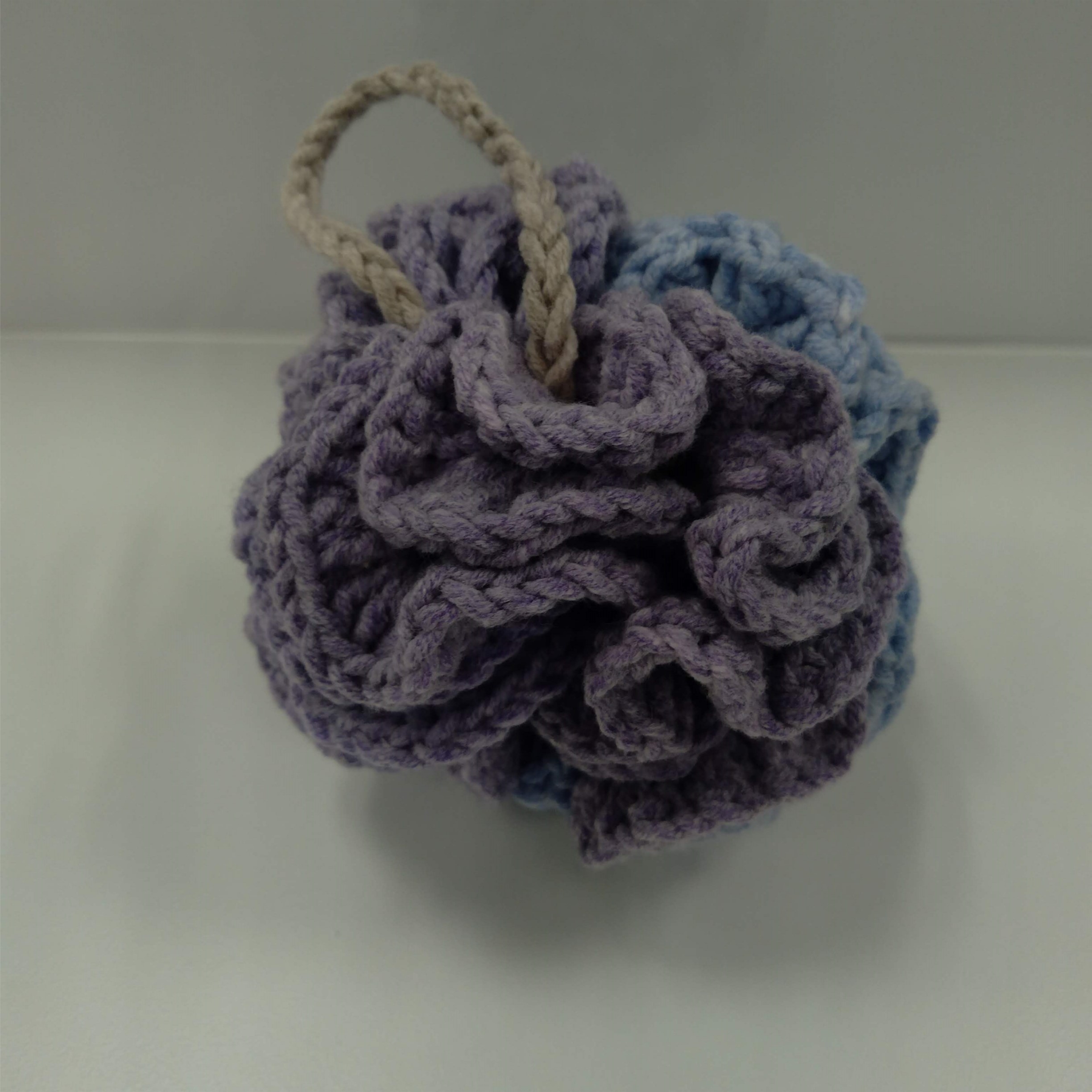 Crocheted lavender and powder blue bath pouf
