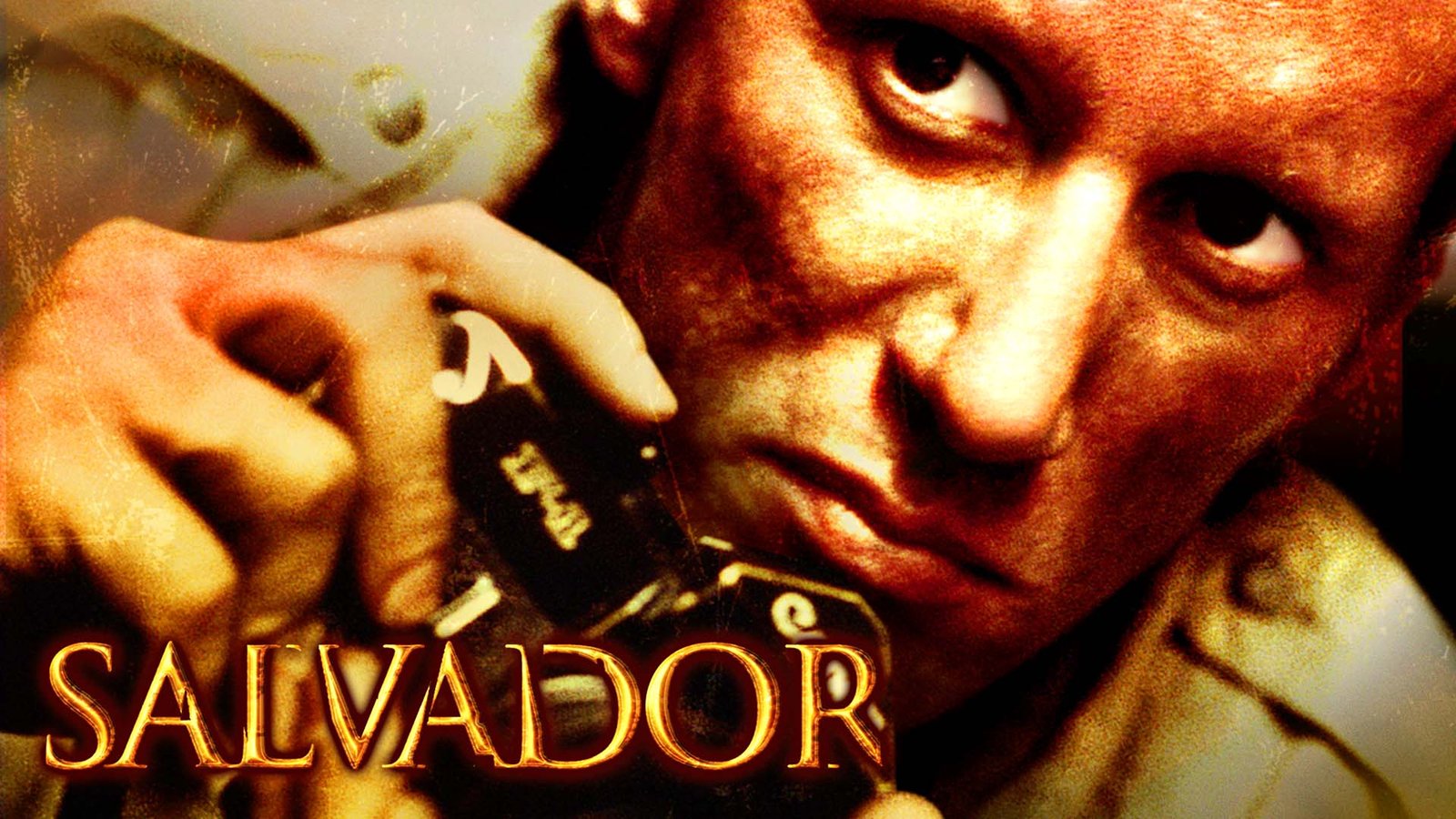 Salvador cover with James Woods's sweaty face and a camera