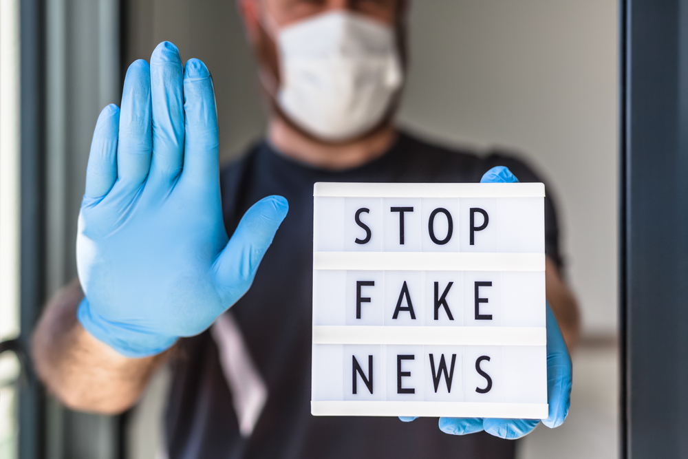 signs stop fake news