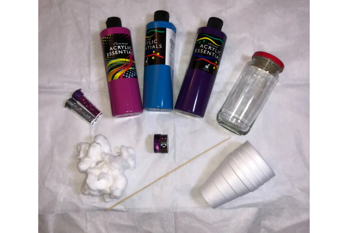mason jar, acrylic paint (pink, purple, blue), Styrofoam cups, wooden stick, tape with a pattern, cotton balls 