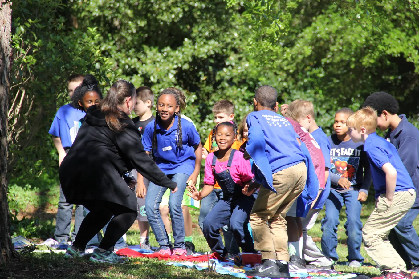 Fourth graders move with the story during Augusta Baker's Dozen