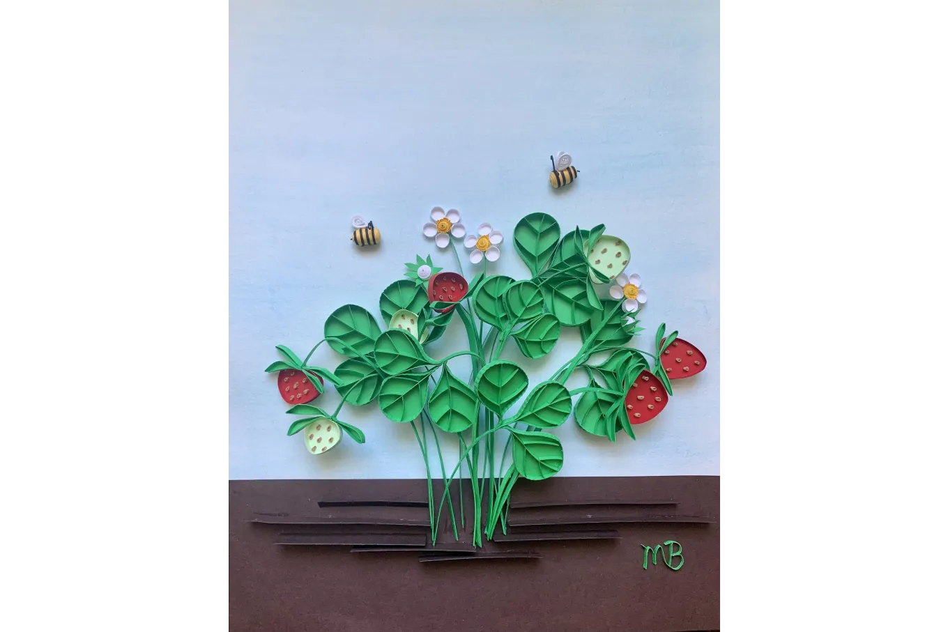 Quilled image of strawberries and bees