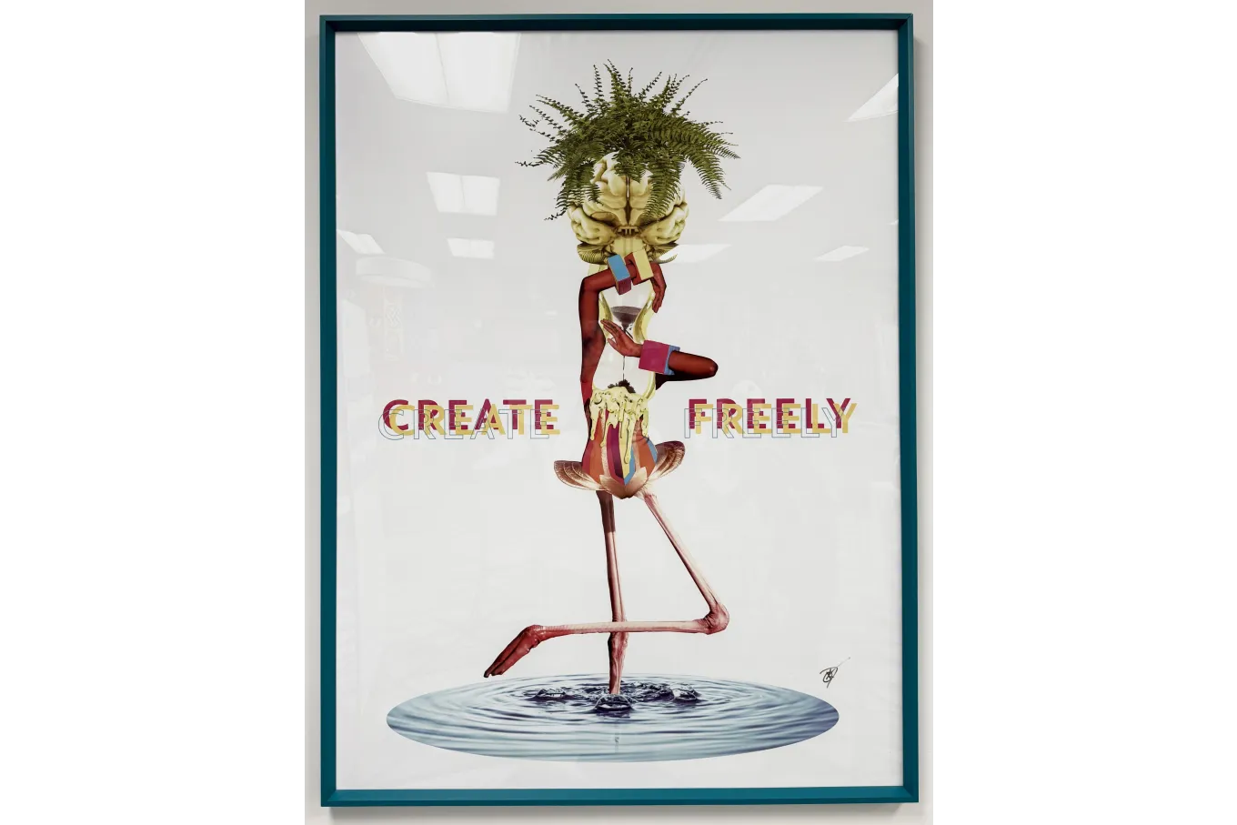 A framed surreal artwork shows a stylized, human-like figure balancing in a yoga tree pose on one leg in a small pool of rippling water. The figure has elongated red limbs, a torso topped with a melting, sculptural form, and a large brain for a head crowned with green fern leaves. Across the center, the words “CREATE FREELY” appear in bold, layered multicolored letters against a clean white background, reinforcing the imaginative and expressive tone of the piece.