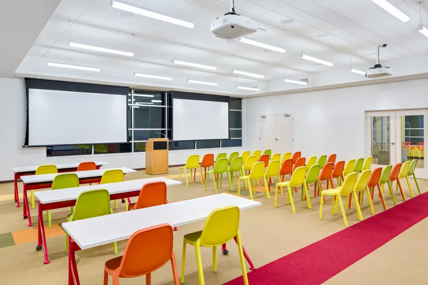 Large meeting room with 30 chairs and tables