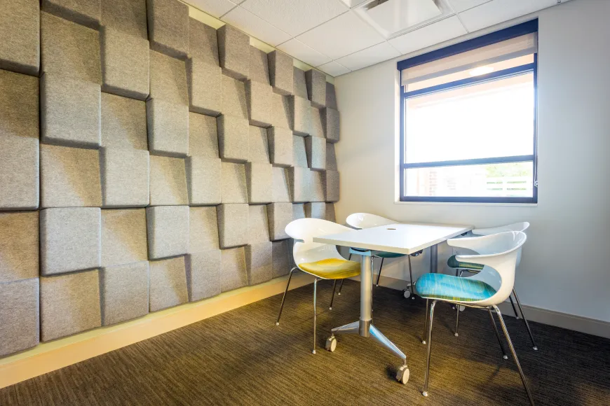 Small meeting room with 4 chairs and 1 table