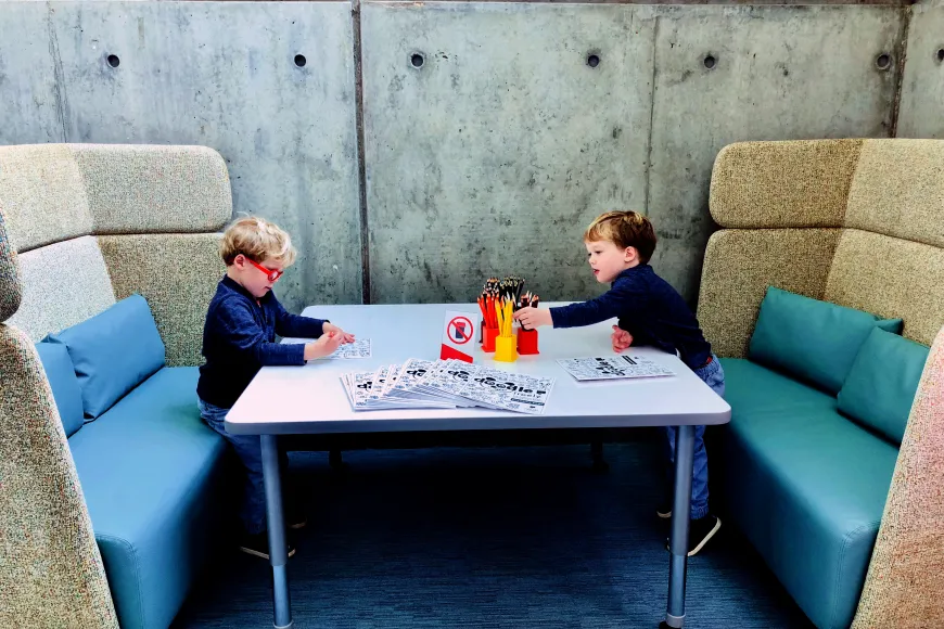 Two boys work in the Education Studio 