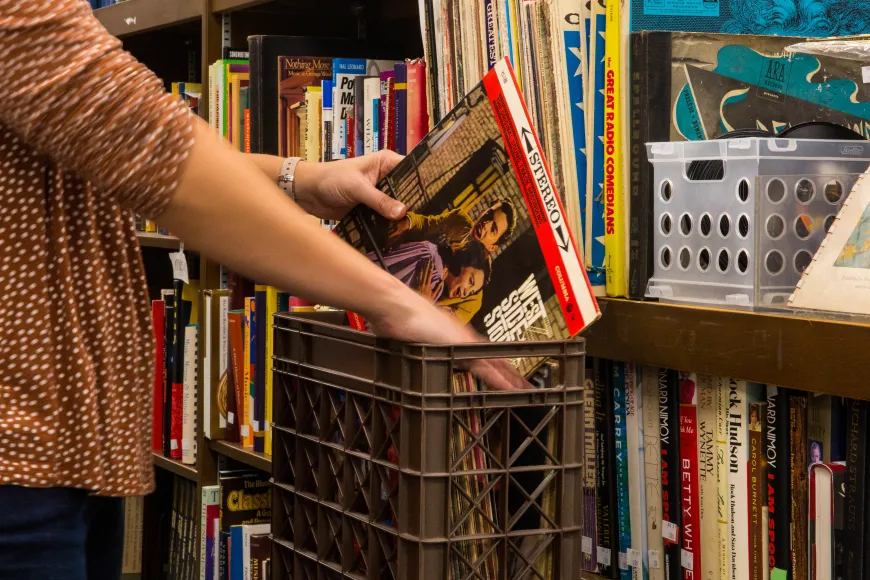 Woman looking through materials