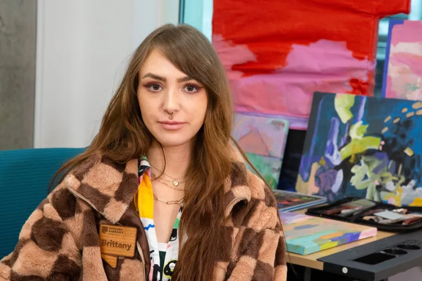 Headshot of AiR Brittany Watkins in their studio at Richland Library Main