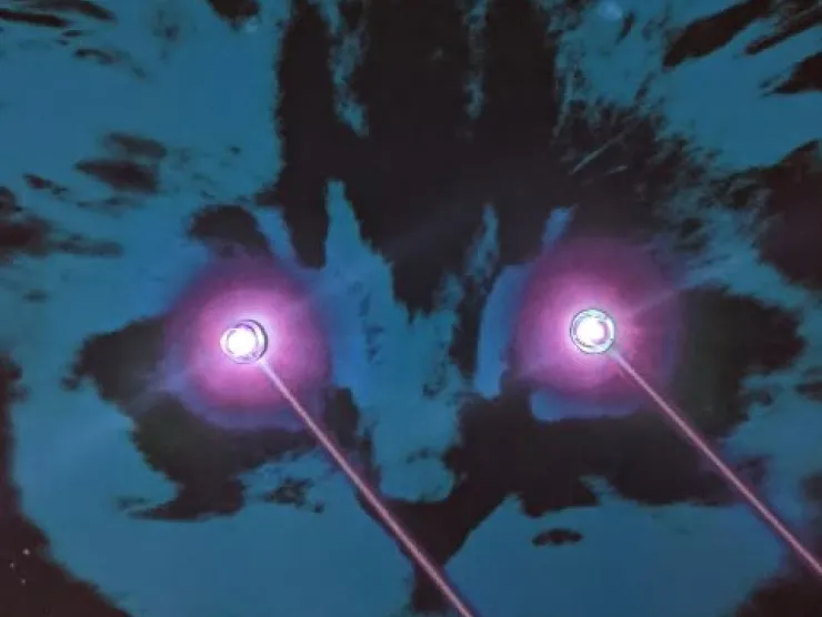 Photo of a cat meme: blue and black fur with purple laser beam eyes, lit up with LED lights