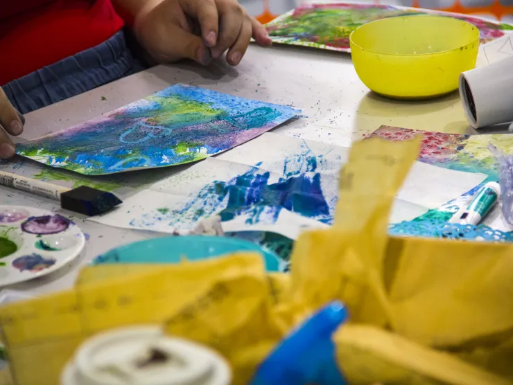 Customer creates paper art at Richland Library