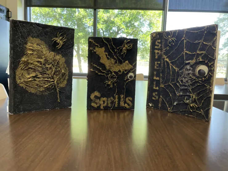 3 DIY Spell Books on a table