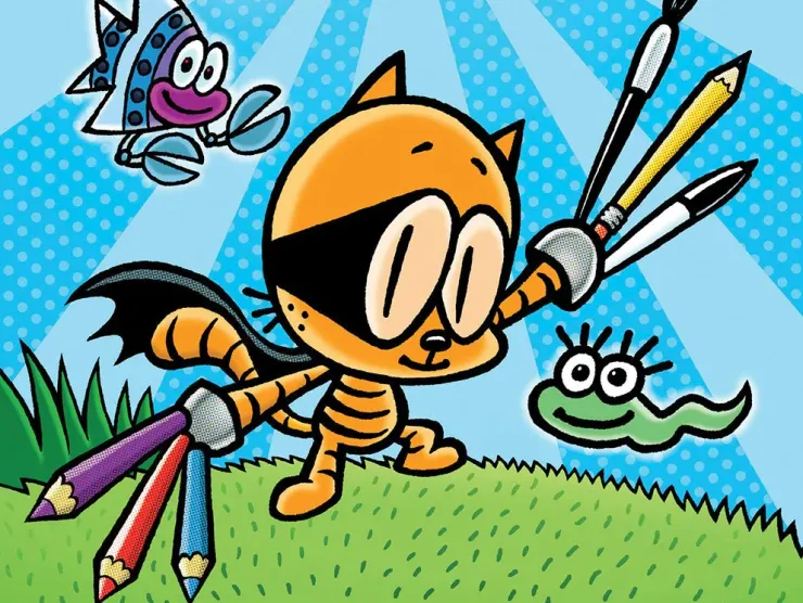 orange cat wearing a superhero mask