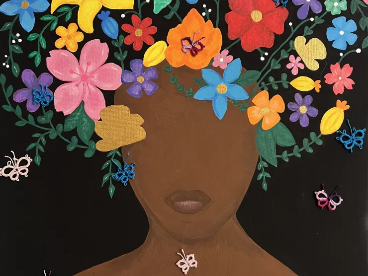 Woman with flowers as hair