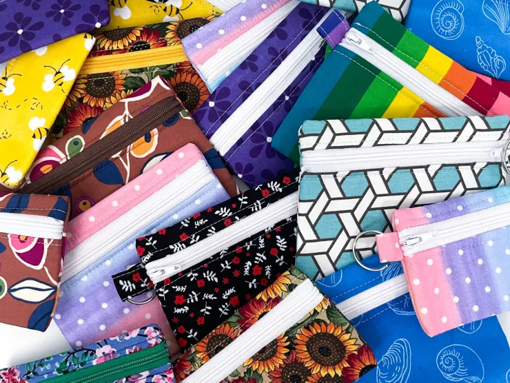 picture of multicolor card sized, fabric pouches with zippers