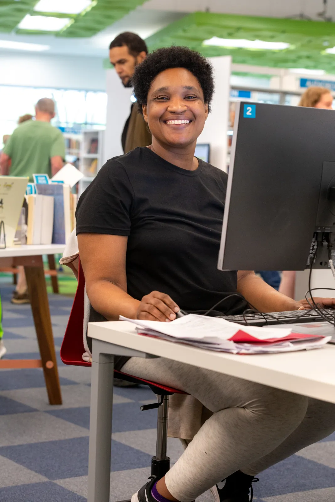 Working on the computer at Richland Library Southeast