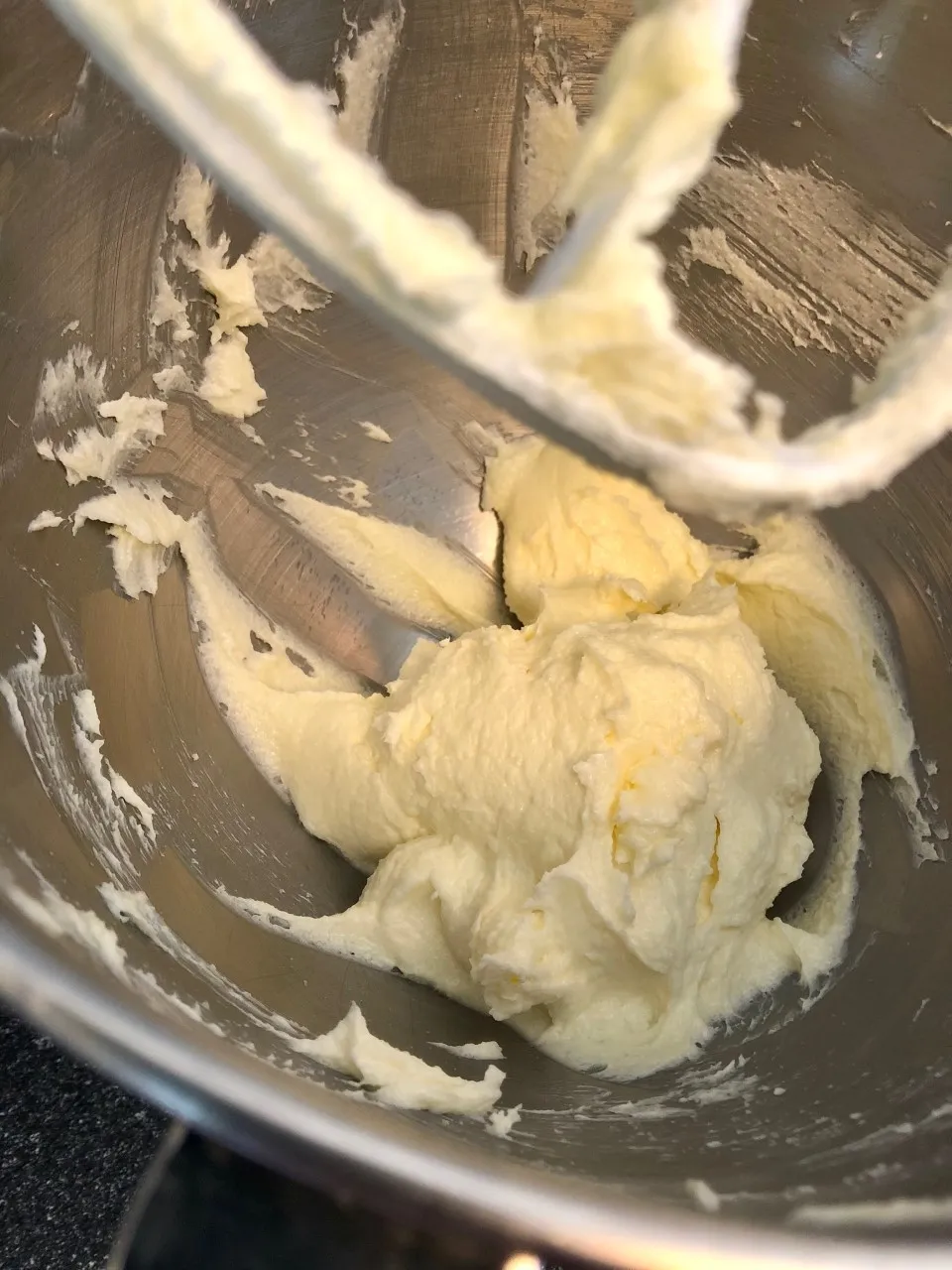 Image of ingredients for lemon bar crust in a mixing bowl with paddle attachment