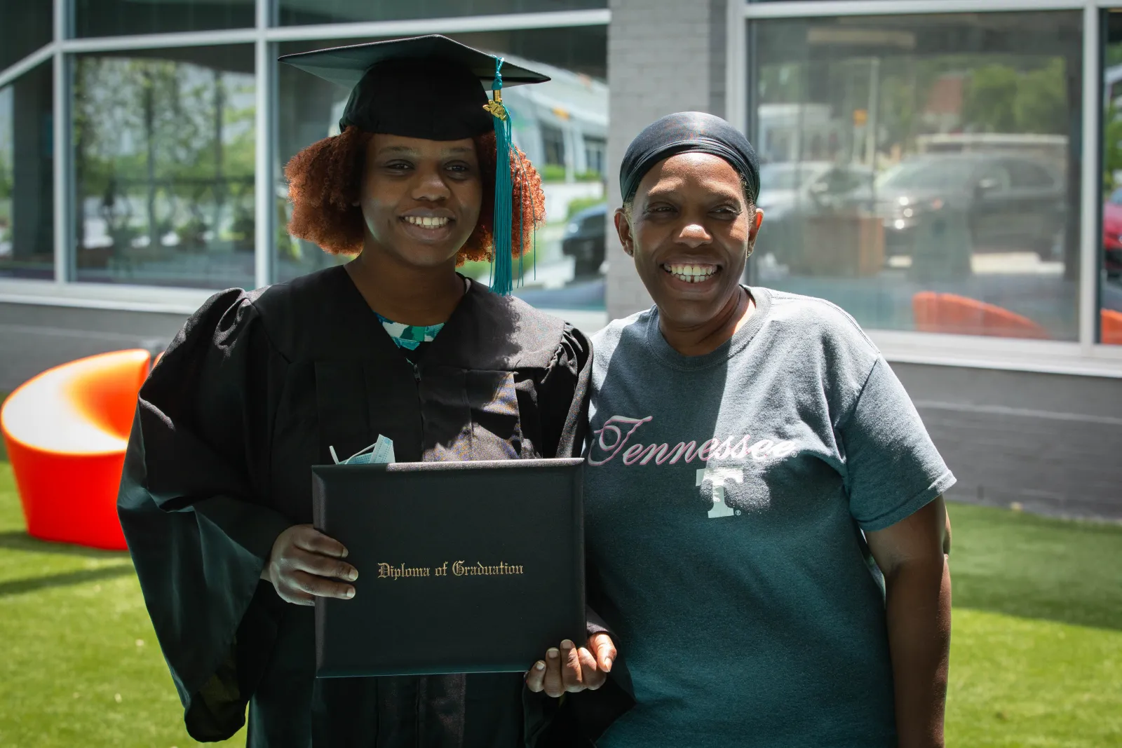 Career Online High School Graduate poses