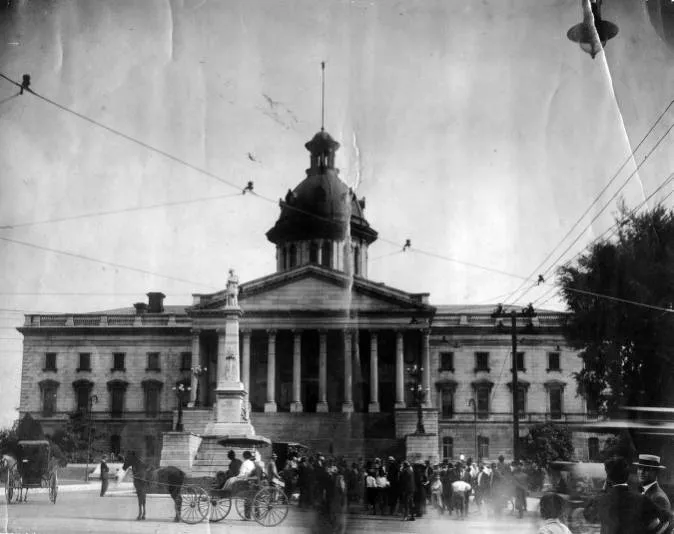 Whalen on the flagpole at State House 1910