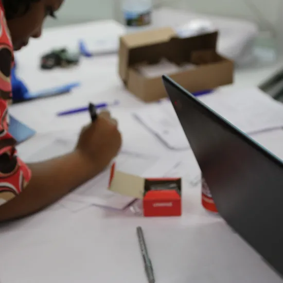 Woman completing paperwork.