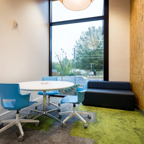 Small study room with five chairs and one table