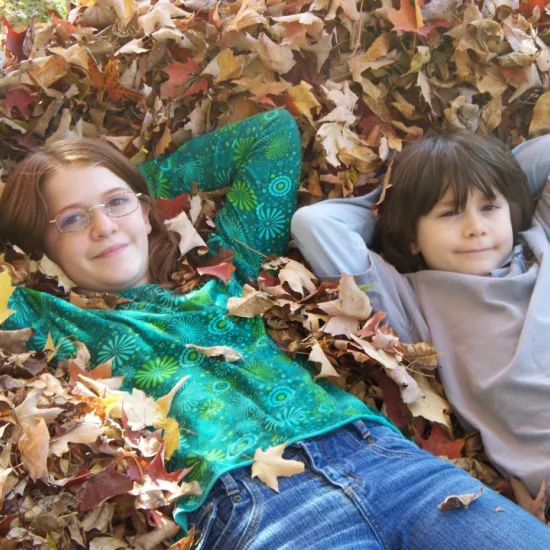 Children in the fall leaves