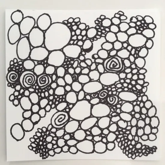 Black ink drawing of many varied circles.