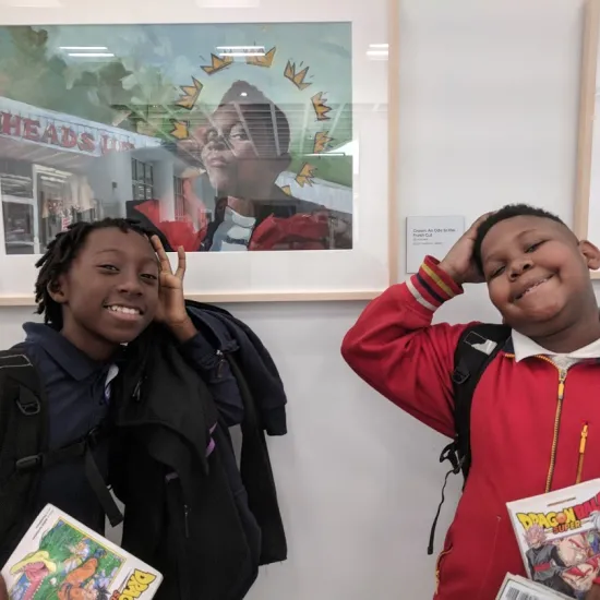 Two boys explore an exhibit at Richland Library