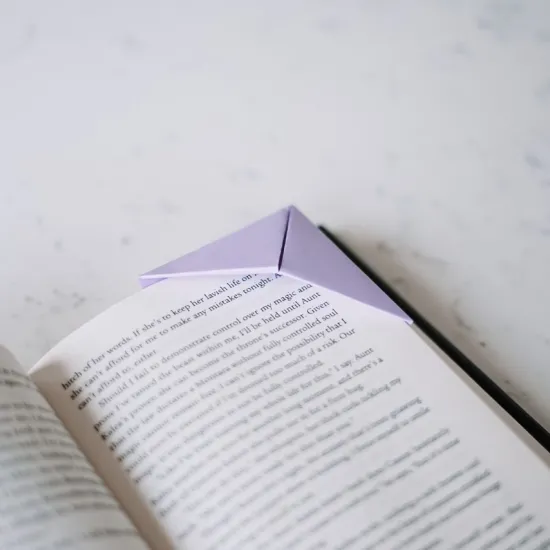 Origami Bookmark on book page corner