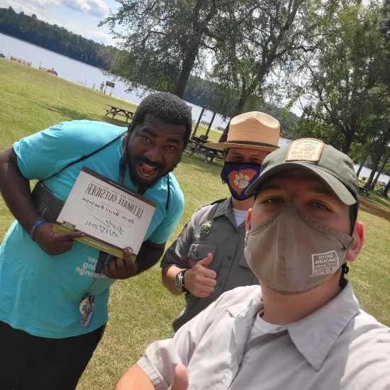 man with park rangers