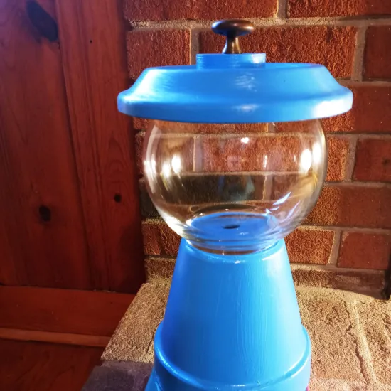 Finish dish made with flower pot and glass bowl 