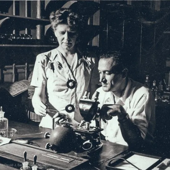 Aimee Wilcox & Laboratory Director, Dr. Seward Miller at an early CDC laboratory